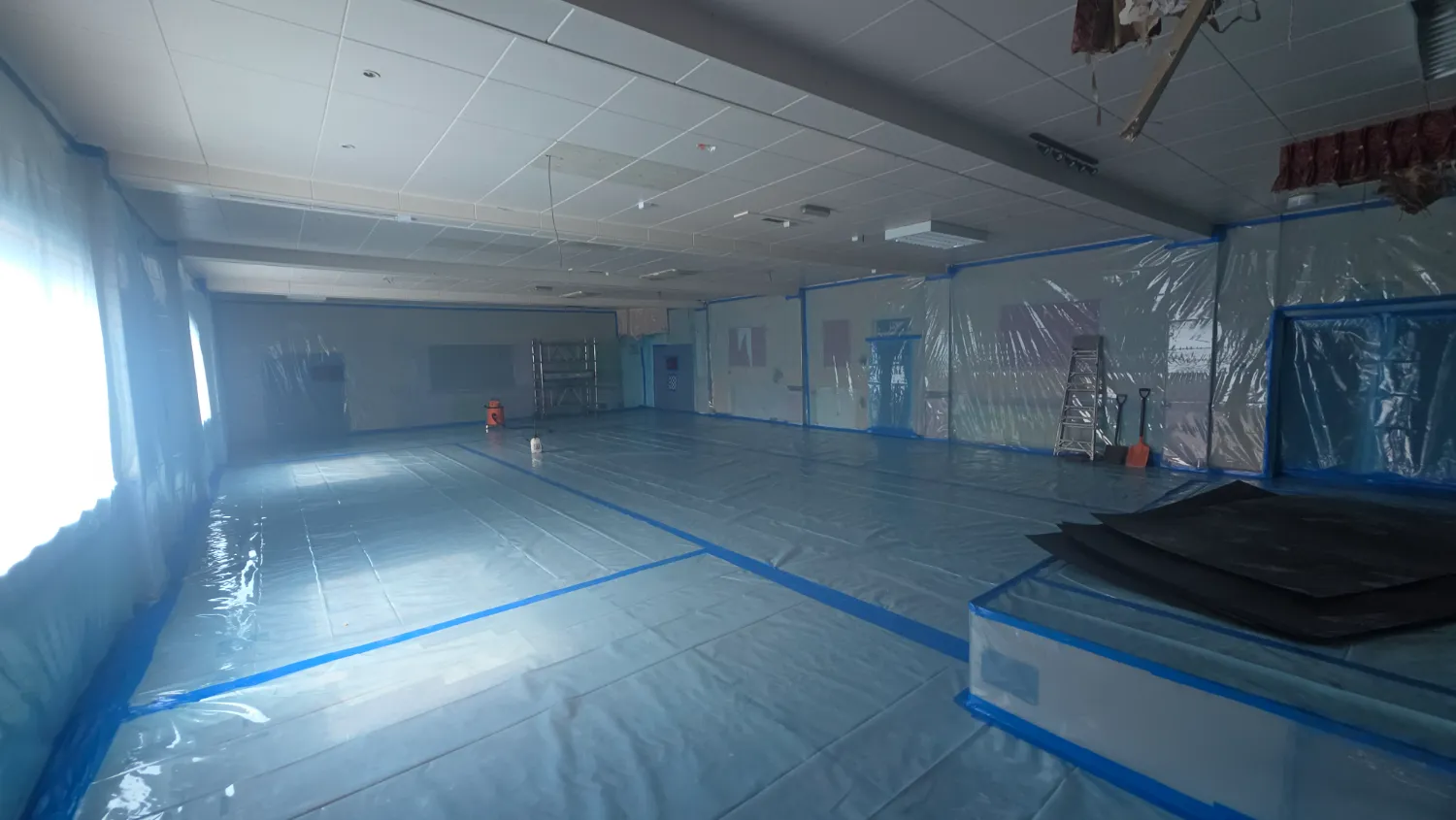 Sequence of works 6&ndash;7: full sheeting of the working areas ahead of enclosure build — St Patrick's licensed asbestos removal project, Southport