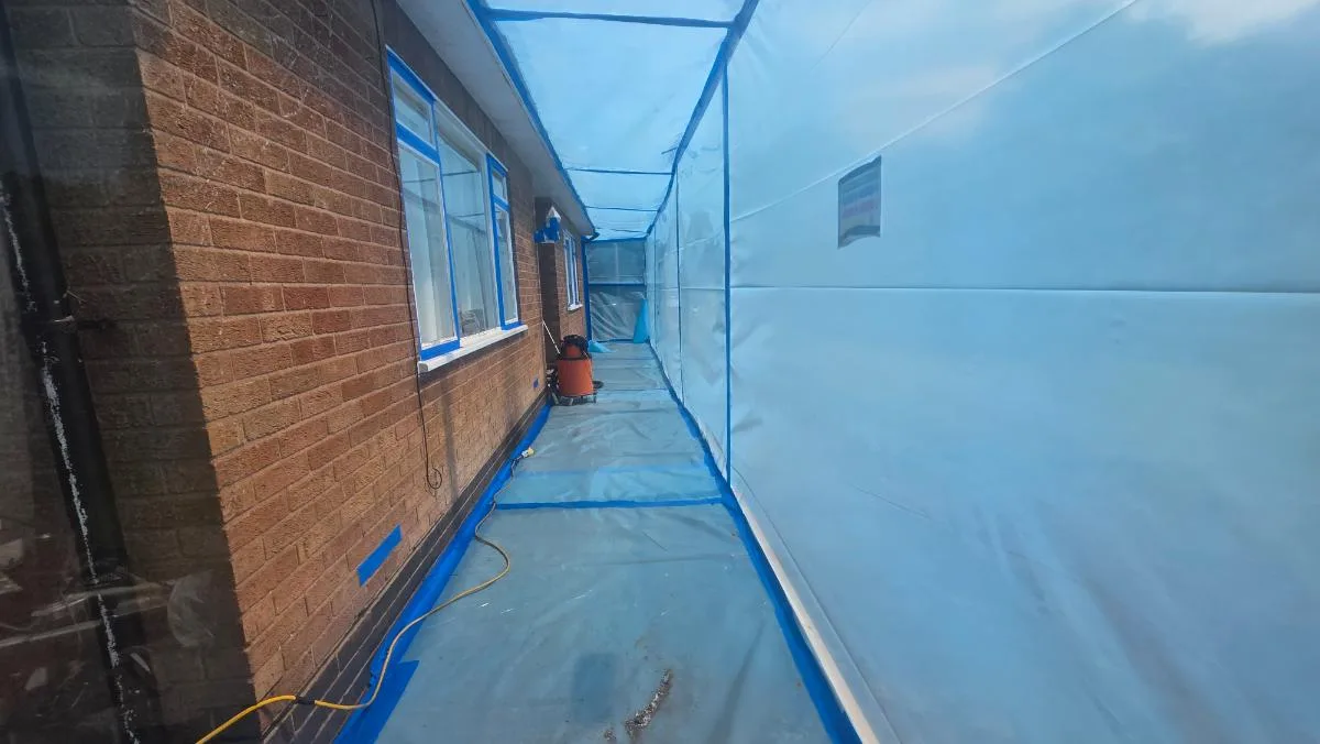 56 linear metres of AIB soffit board removed at Avondale — on-site photo 3 — Innov8 UK Group