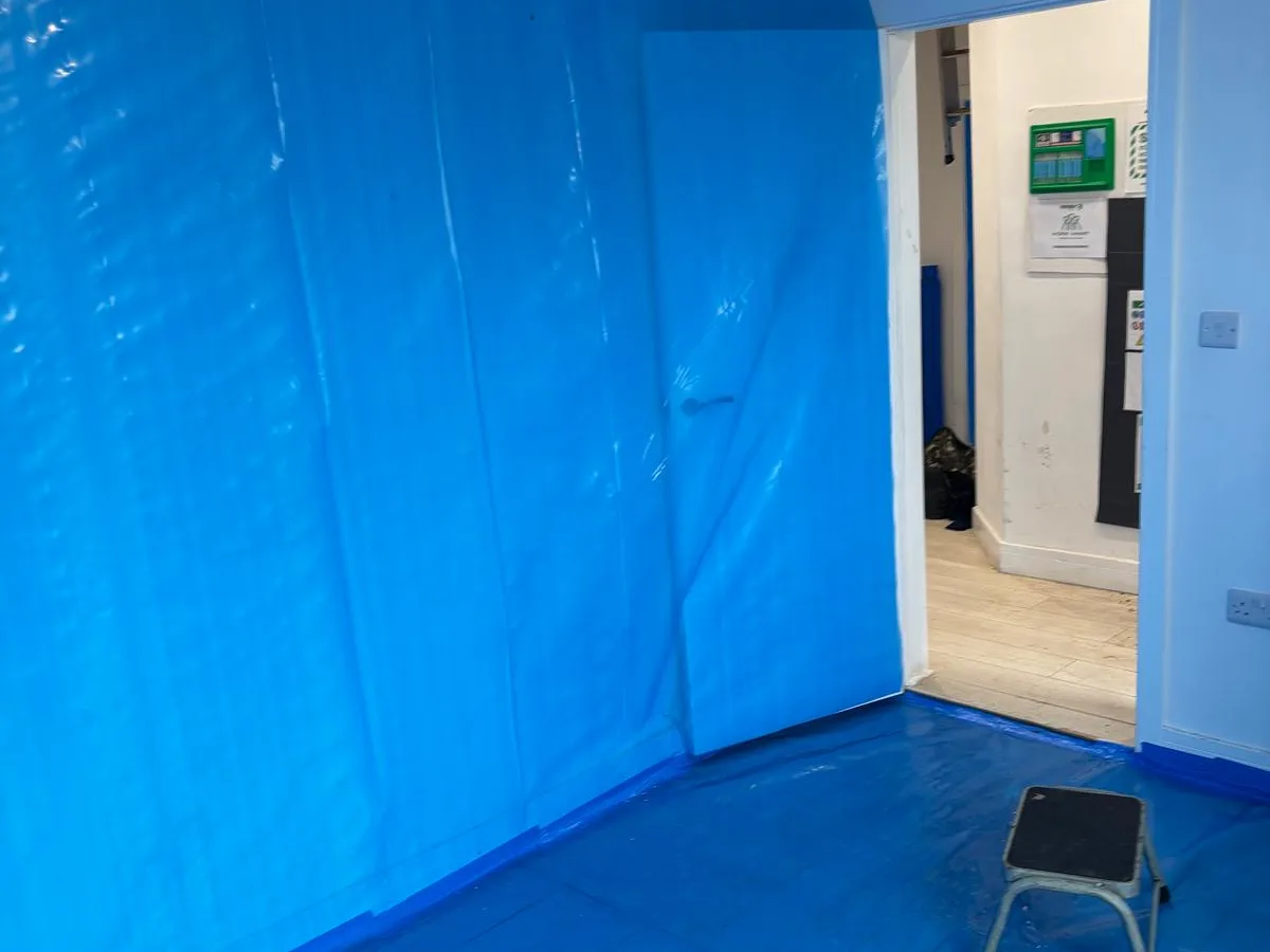 100m² of asbestos insulating board ceilings removed at Belhaven Road, Manchester — on-site photo 1 — Innov8 UK Group