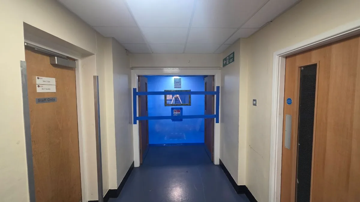 Cardinal Newman High School — corridor sealed with polythene ahead of the works — Innov8 UK Group