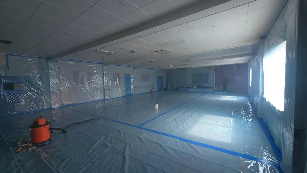 200m² AIB function room ceiling removal at St Patrick’s Social Club — on-site photo 2 — Innov8 UK Group