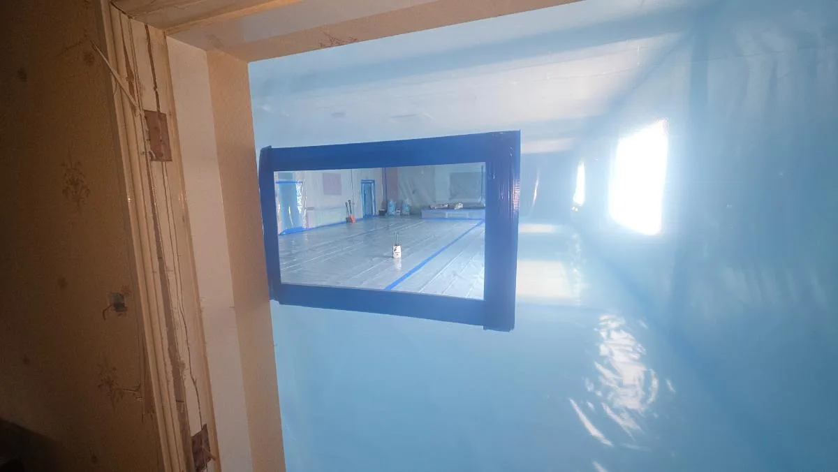 200m² AIB function room ceiling removal at St Patrick’s Social Club — on-site photo 9 — Innov8 UK Group