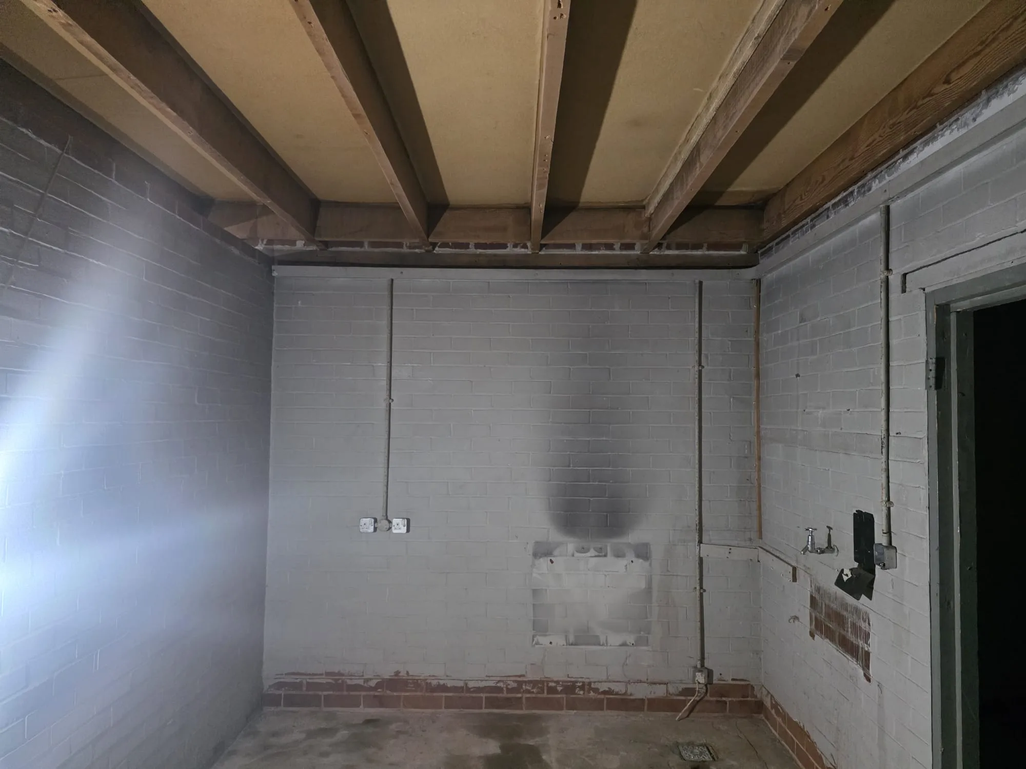 Whitley Bridge, Goole — after — cleared room with air monitoring in place — Innov8 UK Group