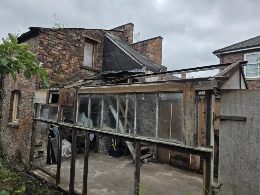 Licensed asbestos removal in Manchester &mdash; cement garage dismantled and disposed, New Street, Altrincham